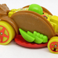 Hot Wheels 2022 - Collector # 011/250 - Fast Foodie 1/5 - Car-De-Asada - Brown / Taco - USA