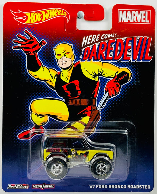 Hot Wheels 2014 - Pop Culture: Marvel - '67 Ford Bronco Roadster - Black & Yellow - Daredevil - Metal/Metal & Real Riders - Large Blister Card