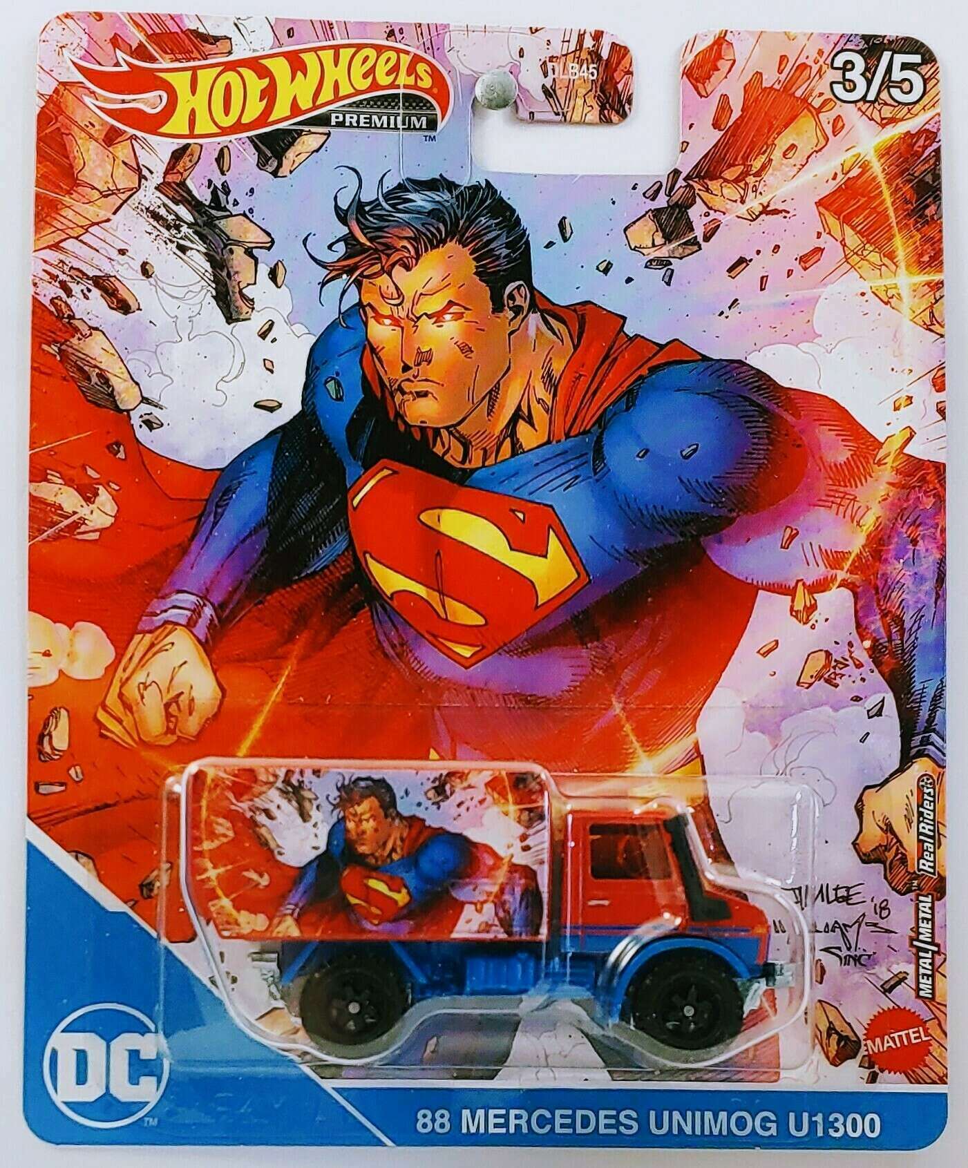 Hot Wheels 2021 -Premium / Pop Culture / DC Comics 3/5 - 88 Mercedes Unimog U1300 - Red / Superman  - MPN GJR24