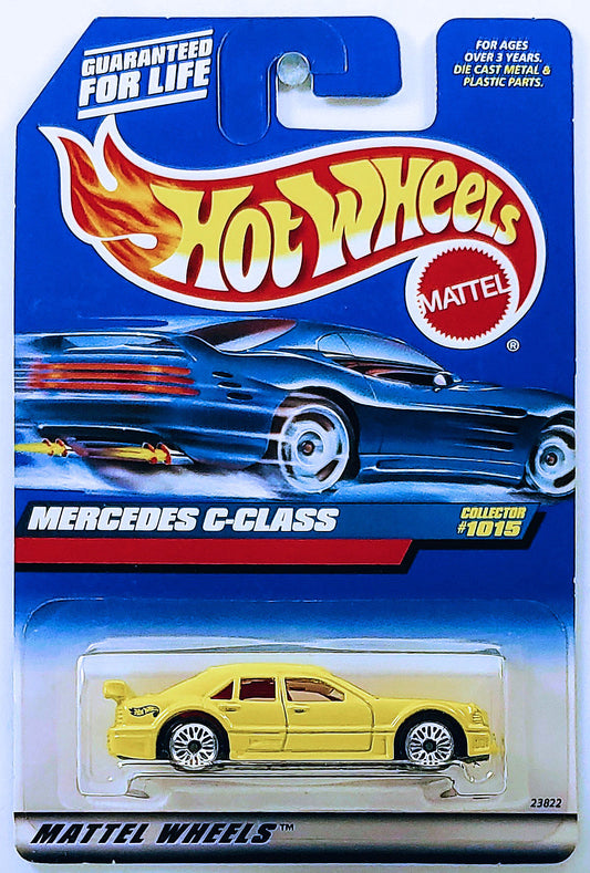 Hot Wheels 1999 - Collector # 1015 - Mercedes C Class - Yellow - USA 'Angled' Blue Car Card